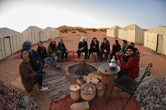 3-Day Luxury/Budget Desert Tour to Marrakech via Merouga from Fez - Camel ride and Berber camp night at Erg Chebbi: stars, dinner, and cold realities