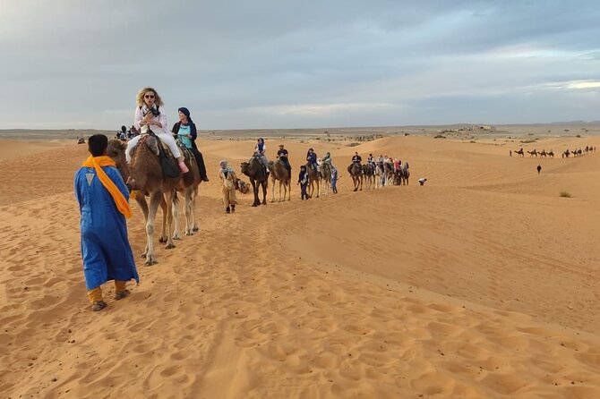 3 Days Luxury Desert Tour From Fes To Marrakech via Merzouga - Merzouga: the camel ride, sandboarding, and that night under the stars