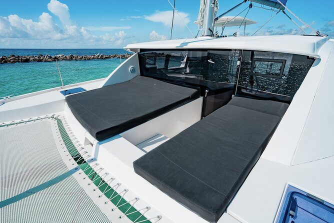 5-Hour 38'Luxury Catamaran All-Inclusive Tulum & Playa del Carmen - Stop 2: La Bocana shallow, clear water plus music on the move