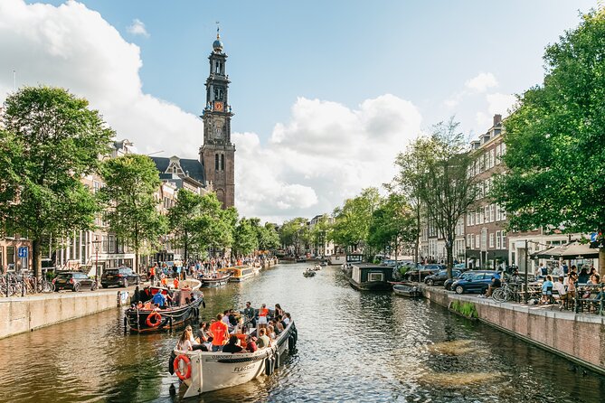 Amsterdam Classic Saloon Boat Canal Cruise with Live Guide - The stops that turn canal scenery into real context