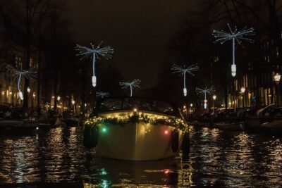 Amsterdam Light Festival: Canal Cruise + Snack & Unlimited Drinks - The Boat Setup Matters: Covered Views, Plastic Covers, and Cold Reality