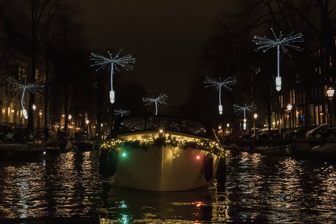 Amsterdam Light Festival: Canal Cruise + Snack & Unlimited Drinks - The Boat Setup Matters: Covered Views, Plastic Covers, and Cold Reality