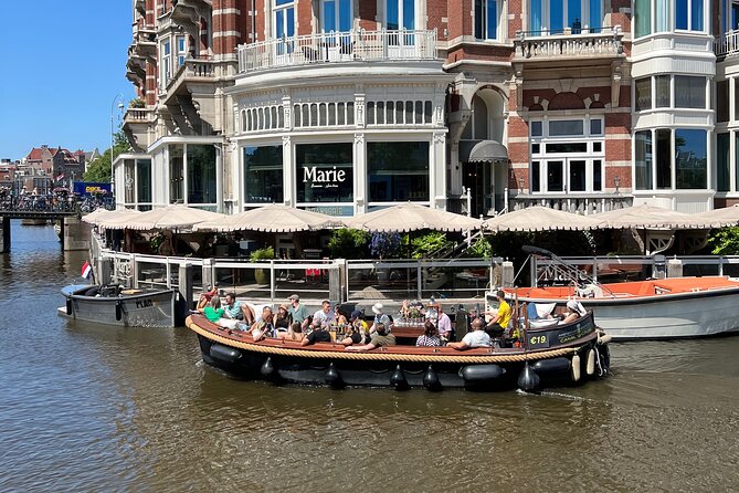 Amsterdam Luxury Boutique Boat tour with Unlimited Beer and Wine - Price reality check: $18.04 for the cruise, plus drinks that may vary