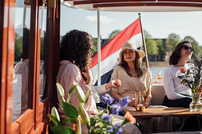 Amsterdam: Luxury Saloon Boat Cruise with Cocktails & Waffle - Value Check: How $18 Can Work (Especially With Open Bar)