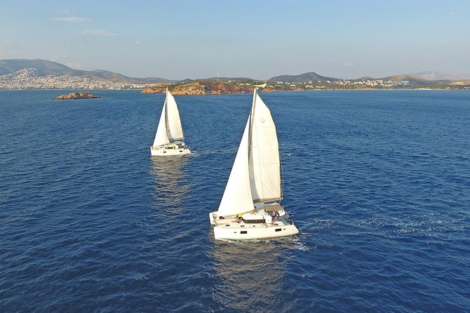 Athens Private Luxury Catamaran Cruise with Traditional Greek Meal and BBQ - Hotel pickup to first sip: what the start feels like