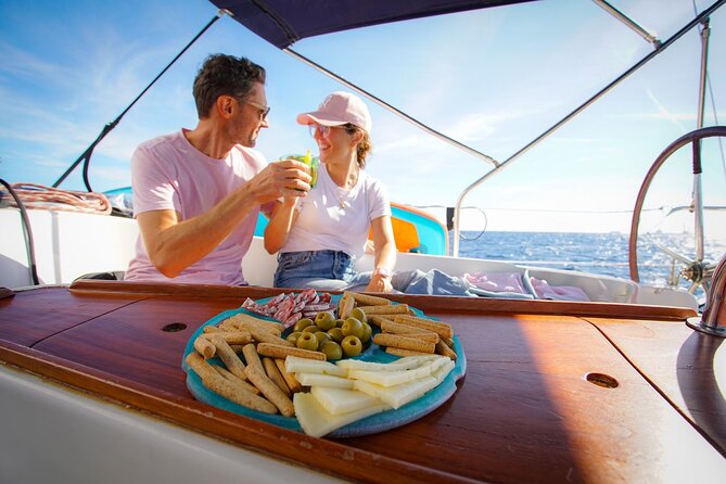 Barcelona Sailing Experience: Spanish Tapas and Premium Open Bar - Swim Time in the Mediterranean: Great When Conditions Cooperate