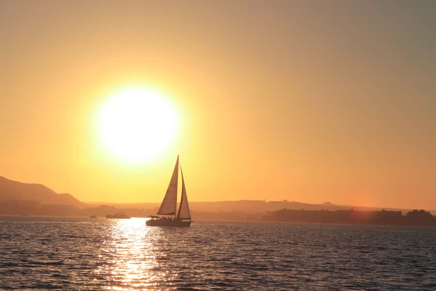 Cabo Luxury Sunset Sailing Adventure with Open Bar - The Beneteau Cyclades deck vibe: drinks, appetizers, and real sailing time