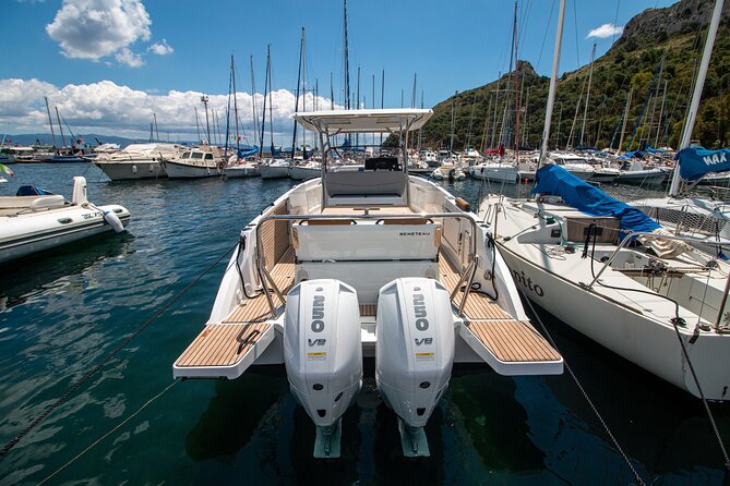 Cagliari 3 Hours Luxury Motorboat Tour - Wine and Snorkeling - Stop #1 to Stop #? Anchoring for snorkeling and swim time