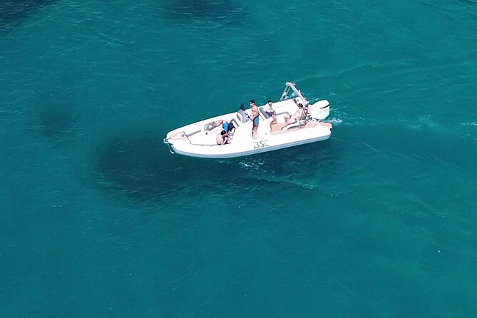 Cagliari Luxury Boat Tour: 3h Premium Snorkeling on New 8m Boat - Cala Bernat: secluded emerald water and white limestone walls