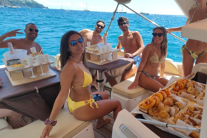 Capri in a Day All Inclusive Premium Boat Tour + City Visit - Grotta Bianca, Grotta Rossa, and Tiberius’ Leap: colors and cliff drama