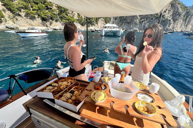 Capri Premium Boat Tour and City Visit Free Bar and Aperitif - Punta Ventroso Aperitif Break: Snacks, Music, and a Beach Option