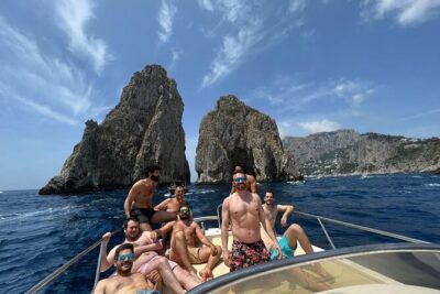 Capri Premium Private Boat Tour + City Visit - Spiaggia Grande and Bagni di Tiberio: Start With Sand and Roman Echoes