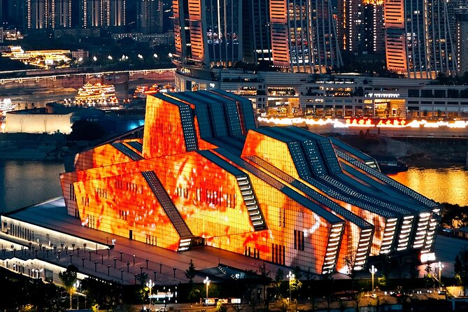 Chongqing private luxury city tour: Must-sees All in One - Chongqing Grand Theatre and Hongyadong at night: river neon from the right bank