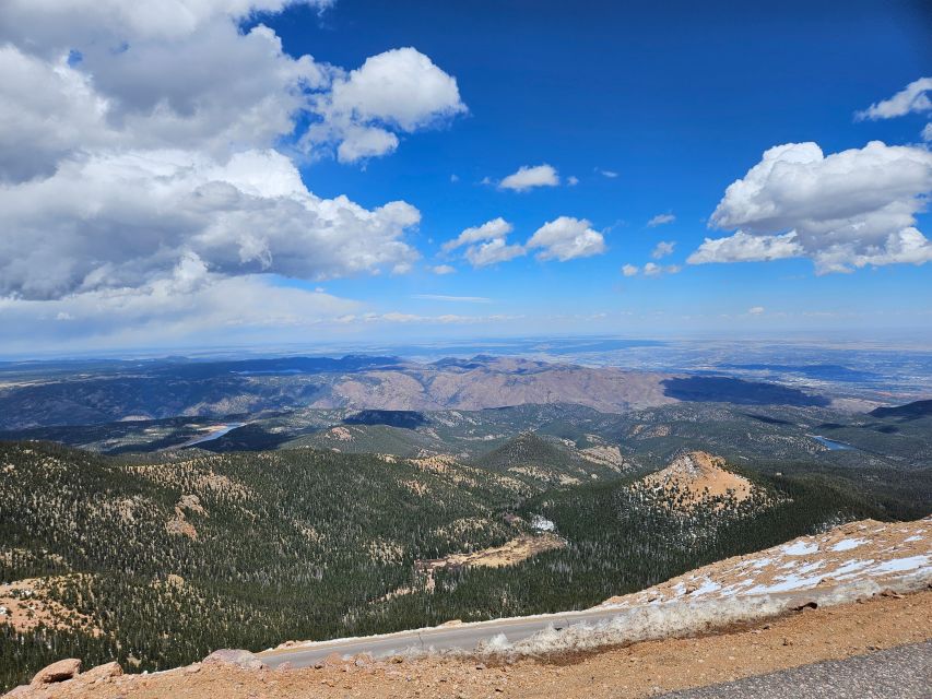 Colorado Springs: Pikes Peak Luxury Jeep Tour - Summit time at 14,115 feet: visitor center, gift shop, and food breaks
