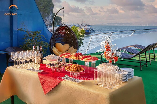 Cozy Bay Halong 5-Star Day Cruise, Buffet, Cave, Kayak, Swimming - Ti Top Island: beach time plus one serious viewpoint climb