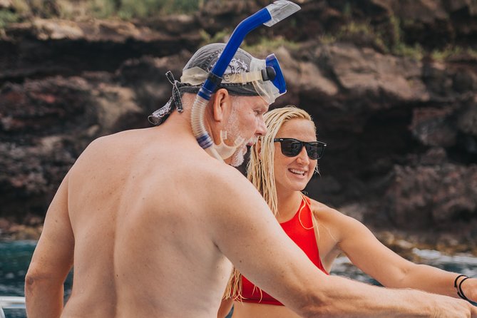 Deluxe Snorkel & Dolphin Watch Aboard a Luxury Catamaran from Kailua-Kona - The waterslide, high jump, and “something for everyone” water time