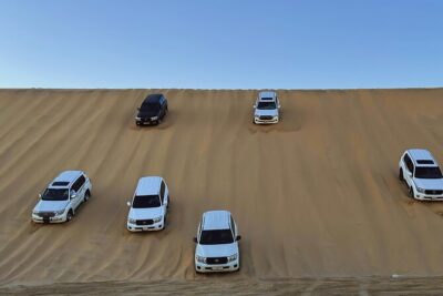 Doha: Luxury Desert Safari, Quad Bike & Sandboarding - Camel Area Break at Sealine Beach: Tea, Quiet Minutes, and Photo Opportunities