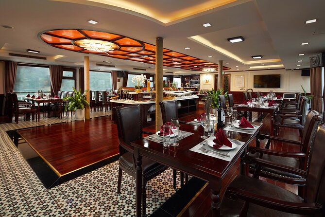 Dora Cruise Luxury 5 Star in Halong & Lan Ha Bay 2 Days 1 Night - Day 1 on board: kayaking, cooking class, and night squid fishing