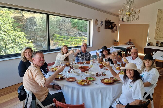 Douro Valley-Expert Guide-Boat-Lunch-Tastings-Offer wine bottle - The Rabelo boat cruise on the Douro River: classic, scenic, and surprisingly fun