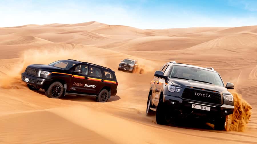 Dubai Desert Safari - Premium BBQ Dinner, Camel Ride & Shows - Live Shows: Tanoura, Fire, and Belly Dance Under the Night Sky