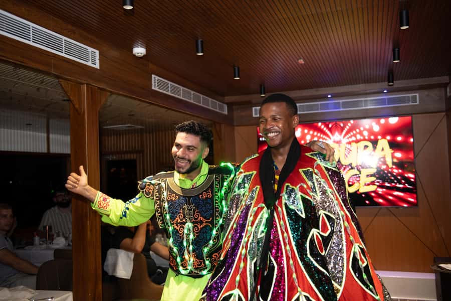 Dubai Marina: Luxury Dinner Cruise, Live Show, Open Bar & DJ - Live Tanura Dance, Darbuka, Singer, and DJ: The Entertainment Flow