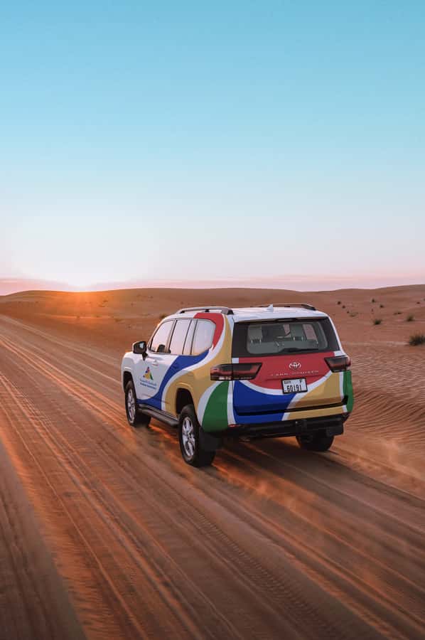 Dubai: Premium Desert Safari, Camel Ride, BBQ & Sandboarding - From Hotel Pickup to the Red Dunes: How the Safari Gets You Moving