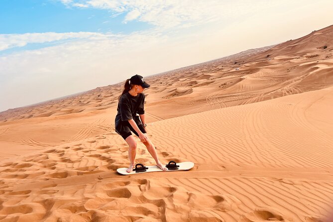 Dubai Premium Desert Safari Red Duns Camel sandbord & Premium BBQ - Camel Riding at the Camp: A Short Ride, Real Desert Atmosphere