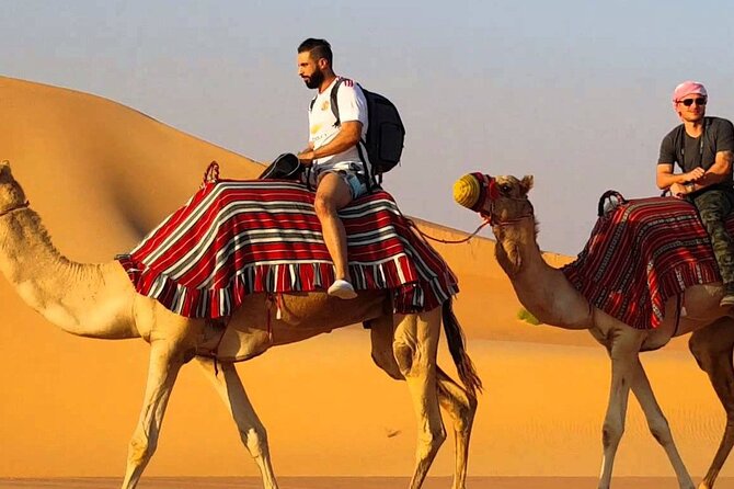 Dubai Premium Evening Desert Safari ATVs, Dinner & Shows - Dinner buffet and the live show lineup: Tanoura, fire, and Ladies Khaliji dance
