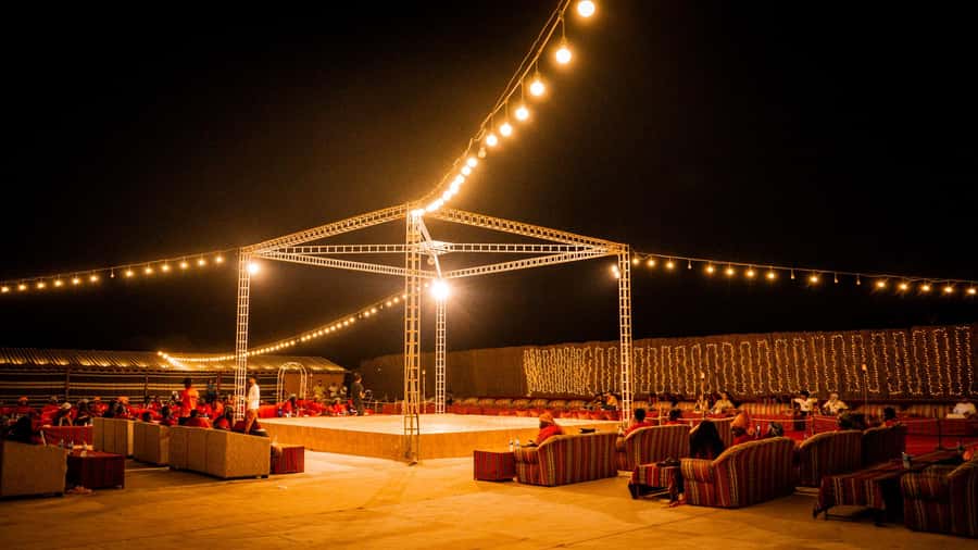 Dubai: Premium Red Dune Safari with Sandboarding & BBQ - Bedouin Camp Arrival: Snacks, Camel Ride, and a Different Pace