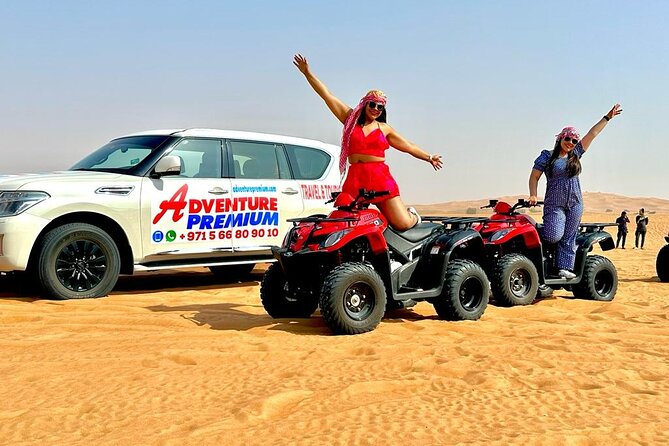 Dubai Premium Red Dunes, Quad Bike, Camel Ride, Sand Surfing & 5<em> BBQ – Key things to know before you go’ /></p>
<ul>
<li><strong>30–45 minutes of dune bashing</strong> in the red Lahbab desert, not a quick drive-by</li>
<li><strong>Quad bike guidance</strong> by an experienced guide, plus a photo stop during the ride flow</li>
<li><strong>Desert camp extras</strong> like henna, shisha, sweets, and star viewing</li>
<li><strong>A proper dinner setup</strong> with BBQ and dance/music in the camp atmosphere</li>
<li><strong>Up to 150 people max</strong>, so you’ll likely share the experience in a group setting</li>
</ul>
<h2 id="lahbab-red-dunes-and-30-45-minutes-of-real-dune-bashing">Lahbab red dunes and 30–45 minutes of real dune bashing</h2>
<p><img width="669" height="446" decoding="async" src=