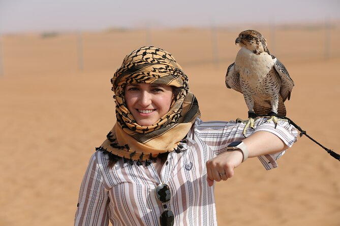 Dubai Premium Red Dunes, Quad Bike, Camel Ride, Sand Surfing & 5<em> BBQ – Henna, falcon photos, and shisha: what these add beyond the Instagram bits’ /><br />
Some of the camp add-ons are more than just visuals. <strong>Henna tattoo</strong> time is a nice break because it’s a slow, human moment in a tour that otherwise moves quickly. You’ll also get <strong>falcon photos</strong>, which helps the experience feel more grounded in desert culture themes rather than only mechanical thrills.</p>
<p><p><strong>Shisha</strong> is included in the experience highlights, and there are also tea/coffee stops. Whether you love shisha or not, the real value is that it’s part of the camp atmosphere and social energy. It gives you a “this is how desert evenings are done” feel, not just a series of rides.</p>
</p>
<p><p>One practical point: if you have strong preferences—like you really want to try shisha, or you specifically want henna—ask early at camp timing. Don’t wait until the end of the night when schedules are already moving. That’s how you protect your must-dos in a group setting.</p>
</p>
<h2 id="bbq-dinner-dance-music-and-star-viewing-after-the-shows">BBQ dinner, dance, music, and star viewing after the shows</h2>
<p><img width="669" height="446" decoding="async" src=