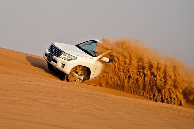 Dubai Premium Red Dunes Safari Camel Ride and BBQ Dinner - How the 4x4 pickup sets the tone for a smooth desert night