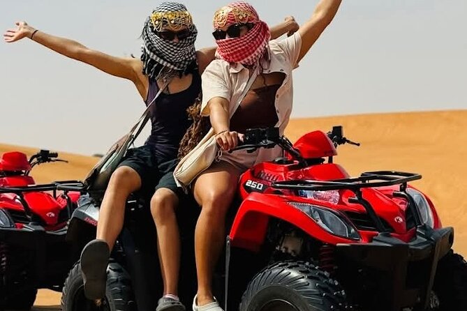Dubai Premium Red Dunes Safari Camel Ride and BBQ Dinner - Live entertainment lineup: belly dancing, Tanoura, and fire show under the stars