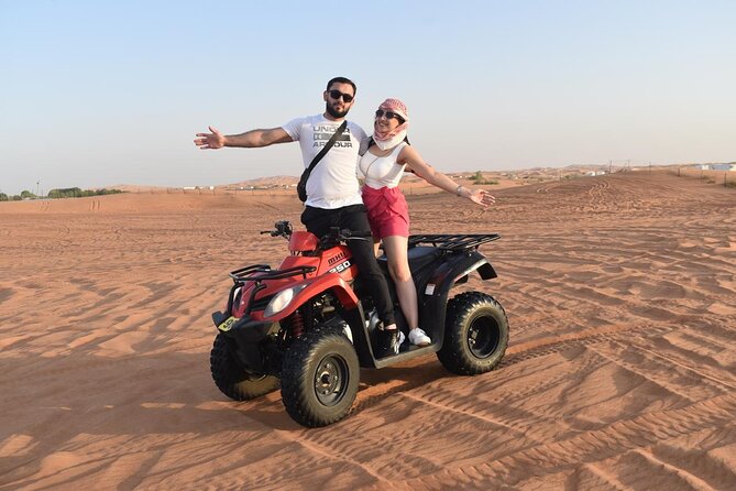 Dubai Premium Red Dunes Safari, Quad Bike, Camels & BBQ - Camel Ride, Henna, and Arabian Costume Photos at Camp