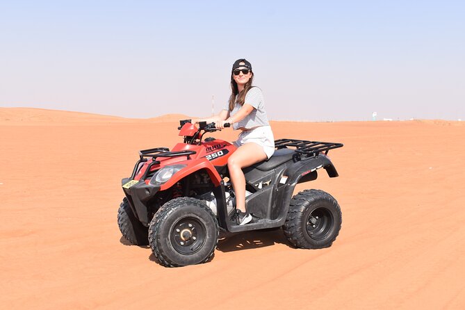 Dubai Premium Red Dunes Safari, Quad Bike, Camels & BBQ - BBQ Buffet Dinner Plus Tanoura, Fire Show, and Belly Dance