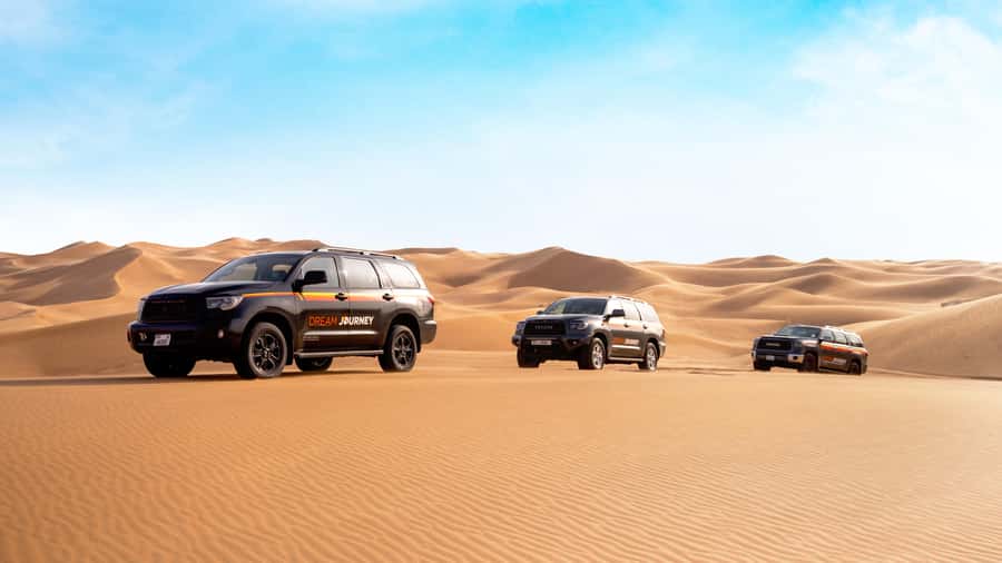 Dubai Waves & Dunes: Luxury Yacht Cruise w/ Red Dunes Safari - Sandboarding and Camel Riding: Fun, Fast, and Photo-Friendly
