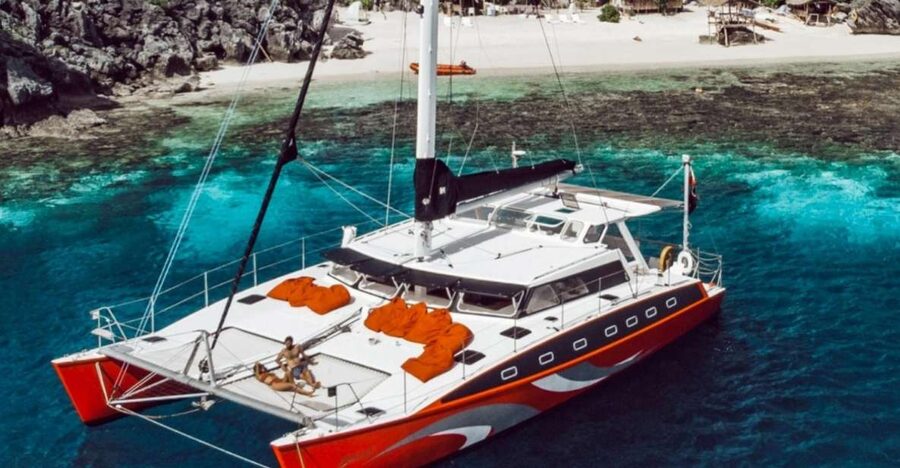 El Nido: Full-Day Premium Island Hopping Catamaran Cruise - Getting to Corong-Corong Pier and finding your red-shirt guide