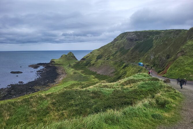 Five Star Giant's Causeway & Belfast Luxury Private Excursion. - Dunluce Castle: Cliff-Edge Ruins With a “Wait, How Is This Still Standing?” Feel
