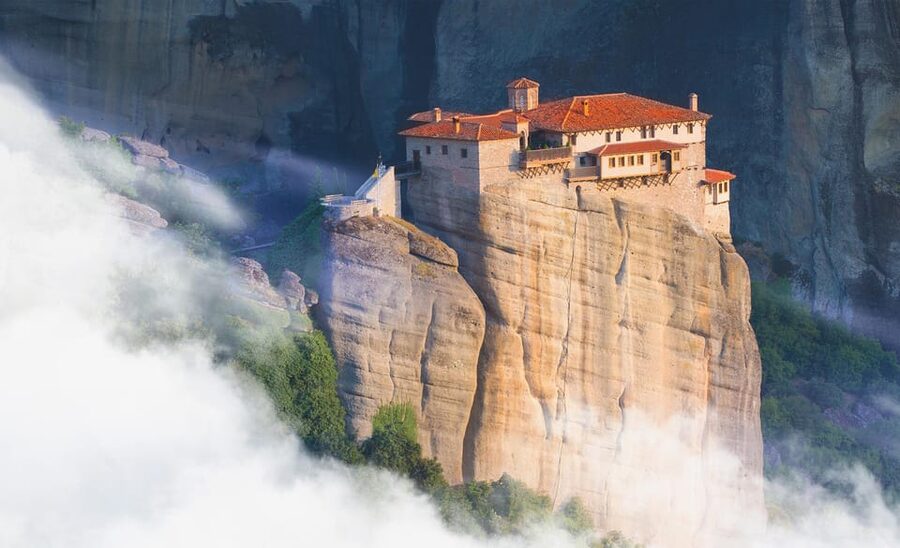 From Athens: Meteora Full-Day Trip with Guide on Luxury Bus - Entering Meteora: three monasteries, guided context, big rock drama