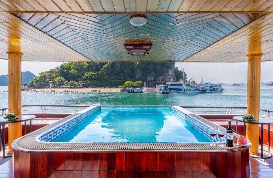 From Hanoi: 1-Day Halong 5-Star Cruise w/Jacuzzi & Limousine - Passing the classic Halong Bay sights while you eat