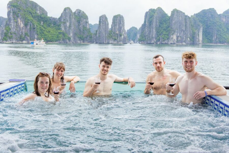 From Hanoi: 1-Day Halong 5-Star Cruise w/Jacuzzi & Limousine - Titov Island: panoramic views plus swim and hike time