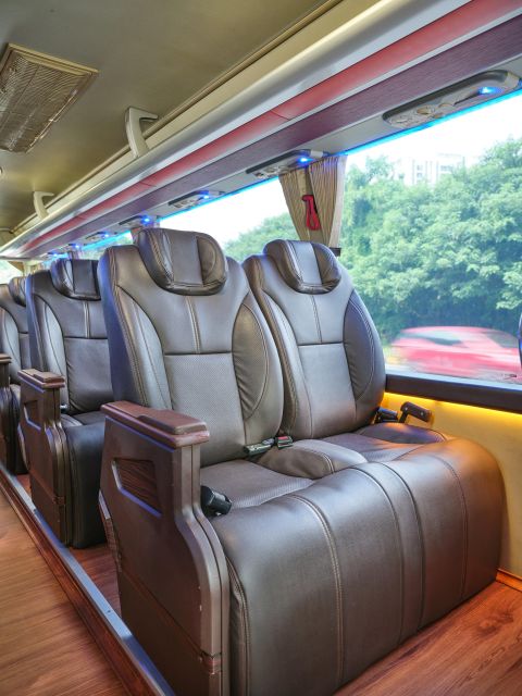 From Hanoi: Ha Long Bay 5-star Day Cruise with Buffet Lunch - Titop Island: Panoramas, a Climb, and Beach Time