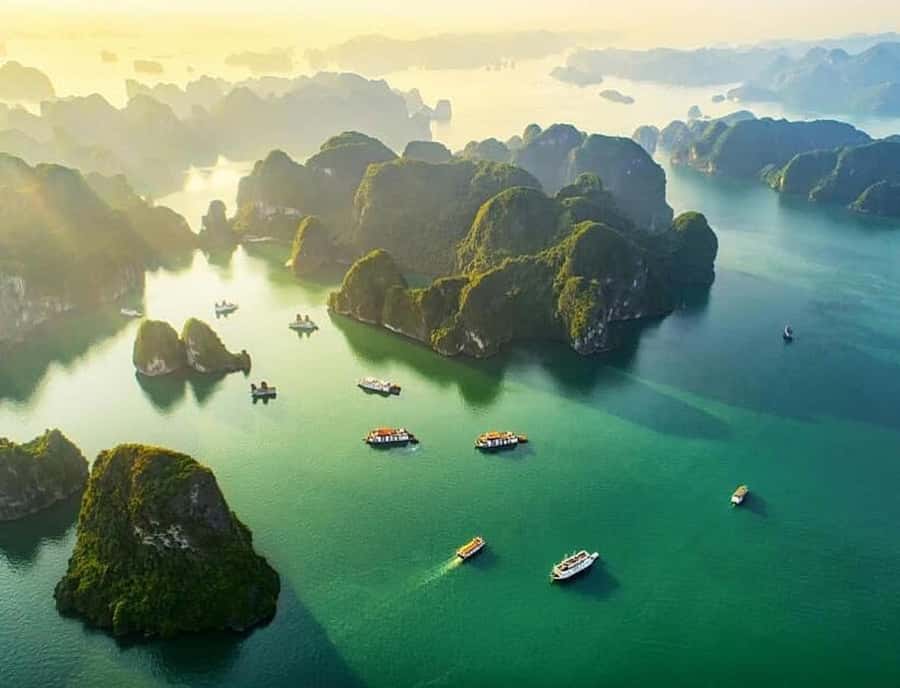 From Hanoi: Ha Long Bay Luxury Day Cruise with Food & Kayak - From Hanoi Old Quarter to Tuan Chau Pier: the Day’s Real-World Start