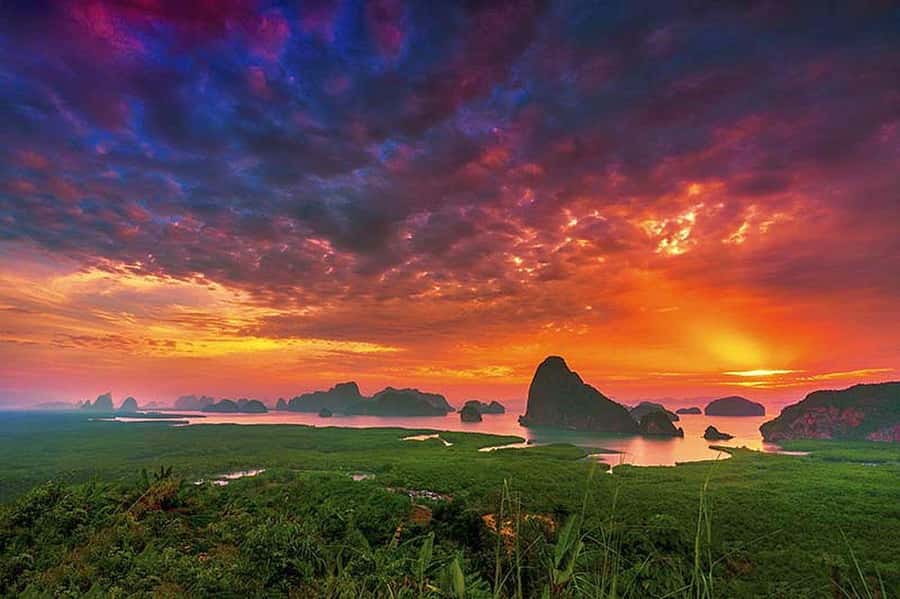 From Khao Lak: Premium James Bond Sunset and Canoe Adventure - Koh Panak: mangroves, a cave passage, and a Jurassic-like lagoon