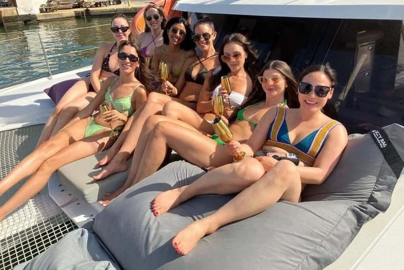 From Palma: Luxury Catamaran Group Tour with Tapas & Drinks - Entering La Lonja Marina Charter Without Stress