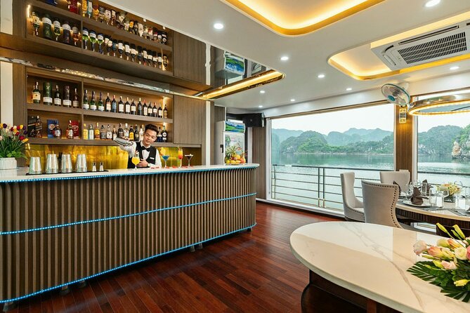 Full day Halong Bay Luxury Cruise - buffet lunch, kayak, swim. - Luon Cave kayaking: included water time plus a wet-clothes warning