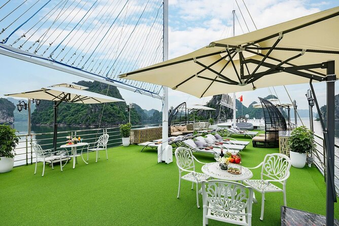 Full day Halong Bay Luxury Cruise - buffet lunch, kayak, swim. - Sunset party onboard: tea, fruit, and the bay after the activity