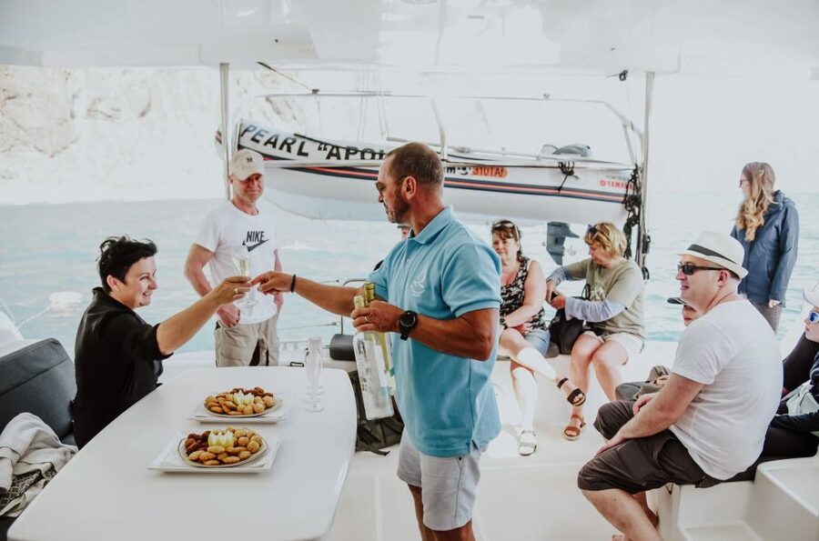 Funchal Bay: Dolphin & Whale Watch Luxury Catamaran Cruise - Cabo Girão at 580 meters: the snorkel and swim stop you’ll remember
