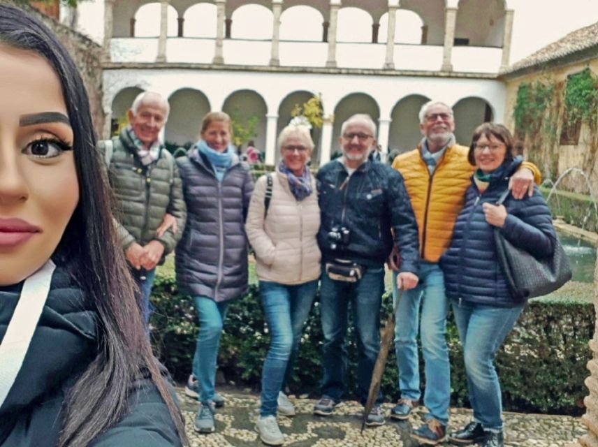 Granada: Full Alhambra Premium Guided Tour with Tickets - Meeting point: find the blue umbrella by the ticket offices