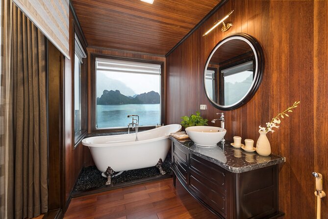 HA LONG BAY - LAN HA CAT BA 2D1N on LA REGINA CRUISE 5<em> LUXURY – Spa time and “downtime planning” on a 5-star ship’ /><br />
This is a small thing that becomes huge on a short cruise. When you’re on the water for two days and you do caves and water activities, your body needs recovery time.</p>
<p><p>La Regina’s <strong>spa</strong> is included in the experience description, and even if you don’t schedule a treatment, it’s a good sign that the ship is set up for comfort. That matters because it gives you a place to reset between events—shade, quiet, and an easy way to feel like the trip is going smoothly.</p>
</p>
<p><p>I also like that the ship has that <strong>library</strong> vibe. It gives you a calm place to sit with your notes, charge your phone, or just watch the bay shift colors without having to compete for space.</p>
</p>
<h2 id="transfers-and-timing-why-the-taxi-boat-part-deserves-respect">Transfers and timing: why the “taxi boat” part deserves respect</h2>
<p><img width="669" height="446" decoding="async" src=